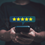 five stars for userevidence hovering over man typing into mobile device